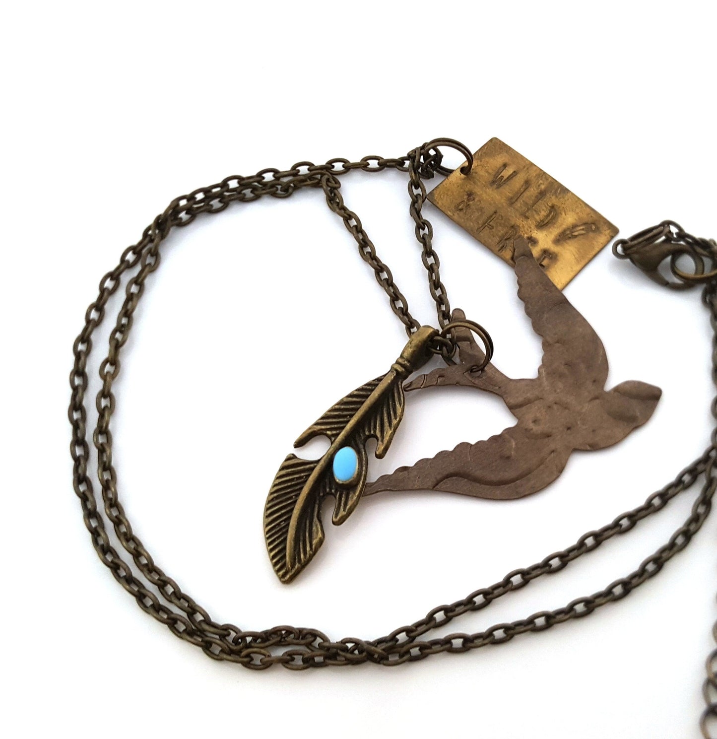 Wild and Free Charm Necklace – Brass Bird, Feather, and Handstamped Tag