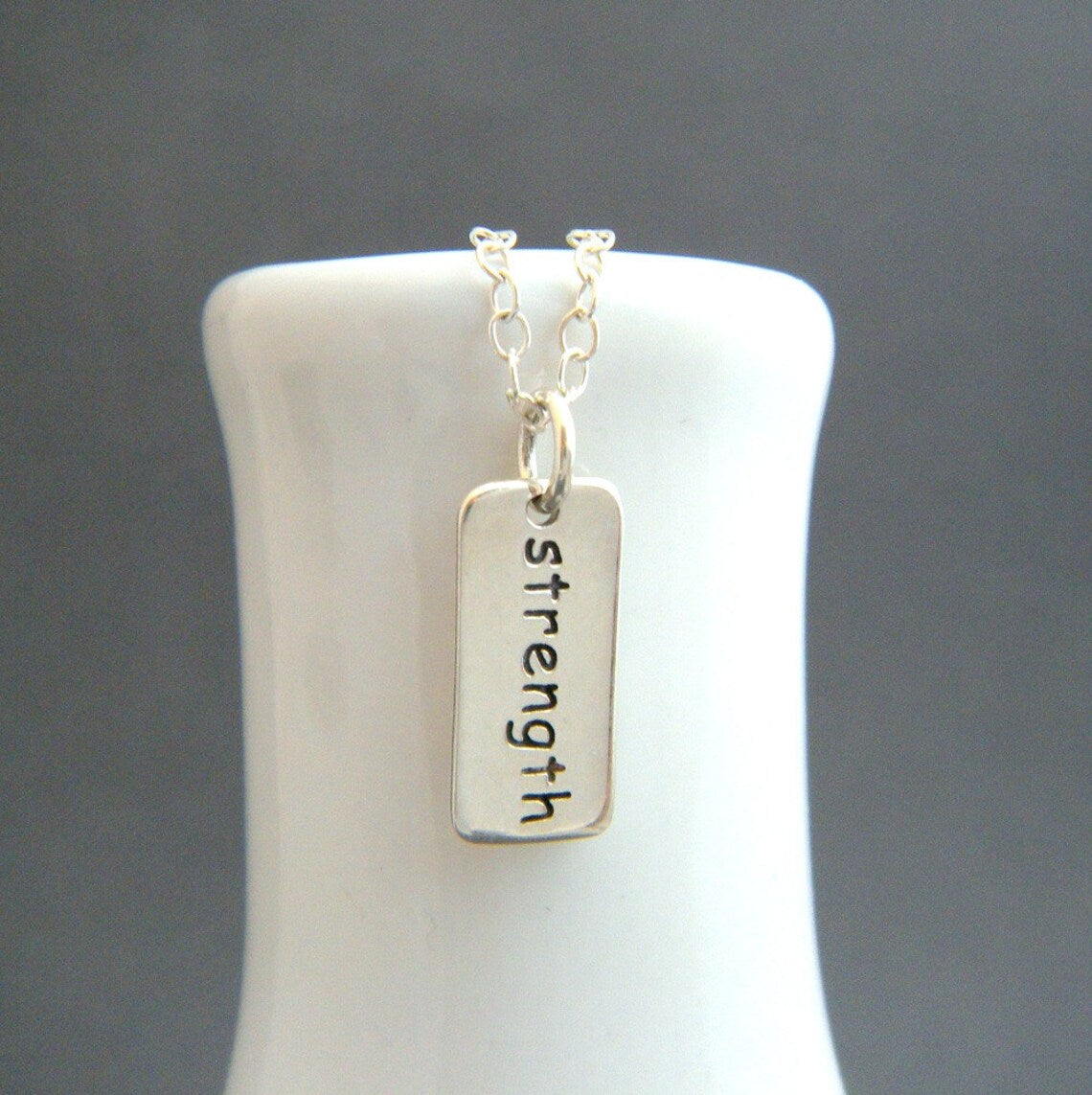 Strength Necklace – Tiny Sterling Silver Word Charm on 16" Chain