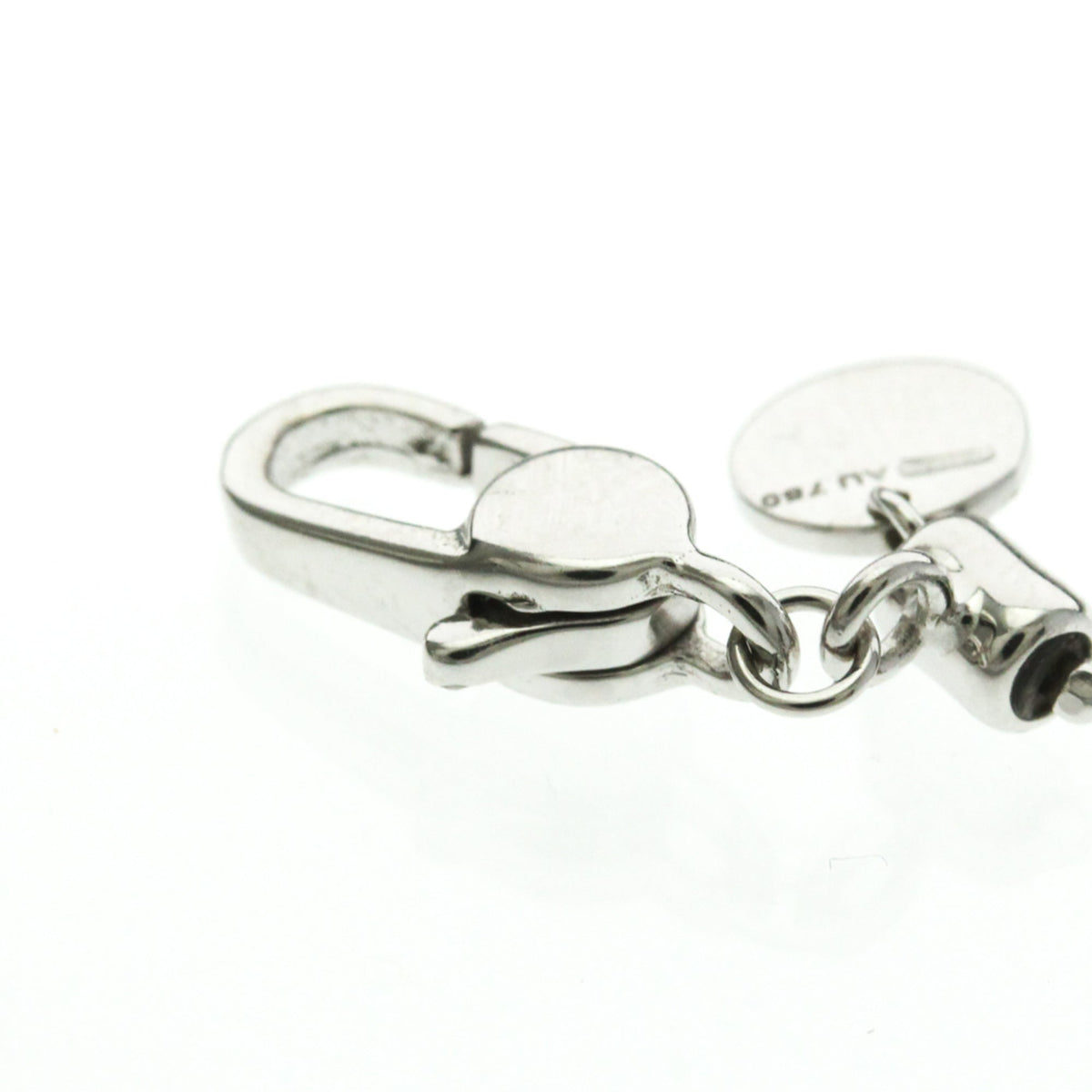 PRE-OWNED Gucci Diamond Tag · 18K White Gold