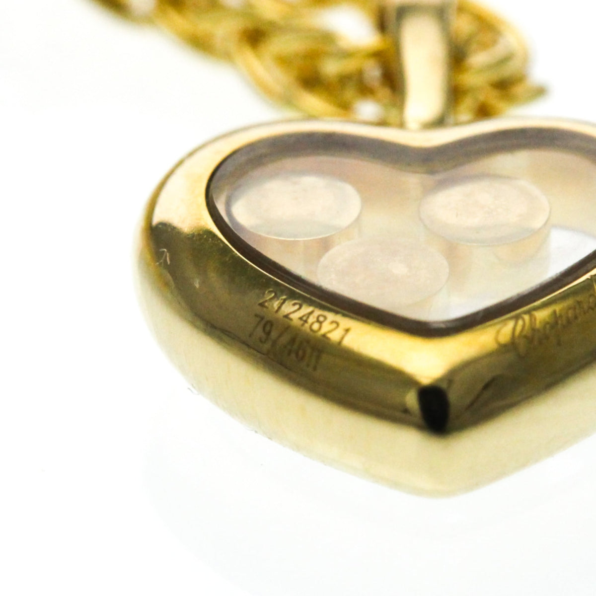 PRE-OWNED Chopard Happy Diamonds · 18K Yellow Gold