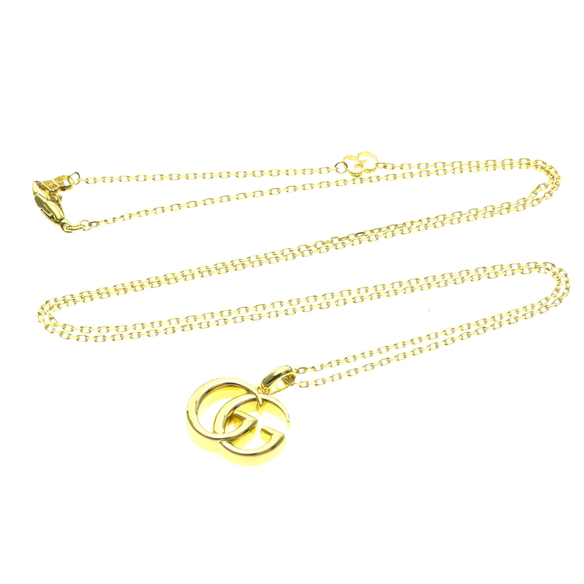 PRE-OWNED Gucci Double GG · 18K Yellow Gold