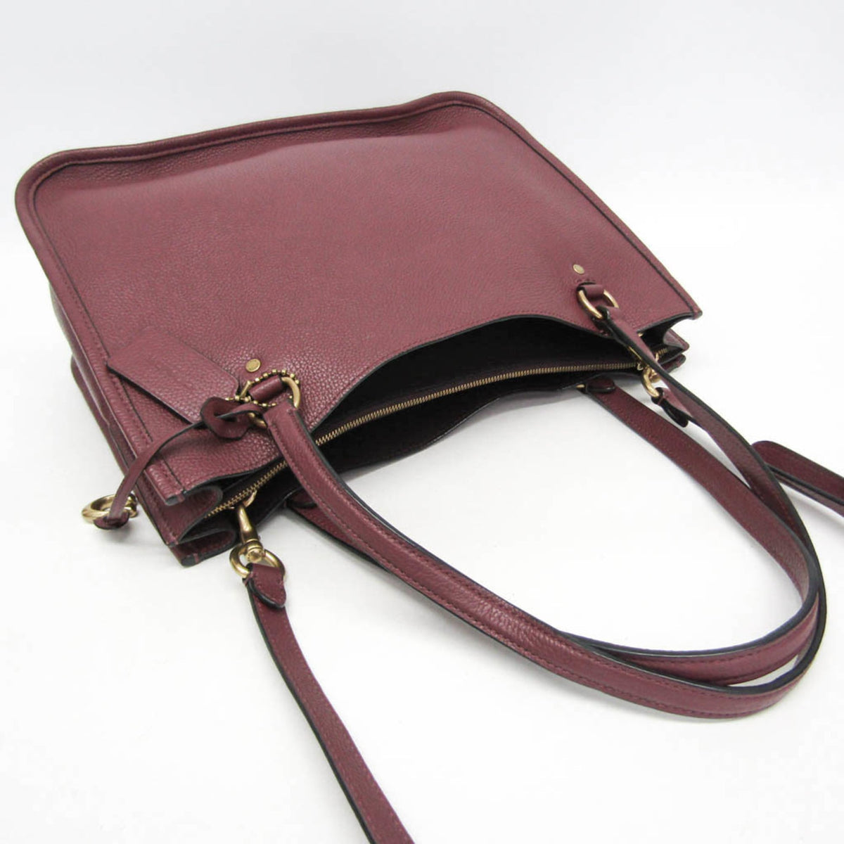 PRE-OWNED Coach Tyler Carryall · Leather