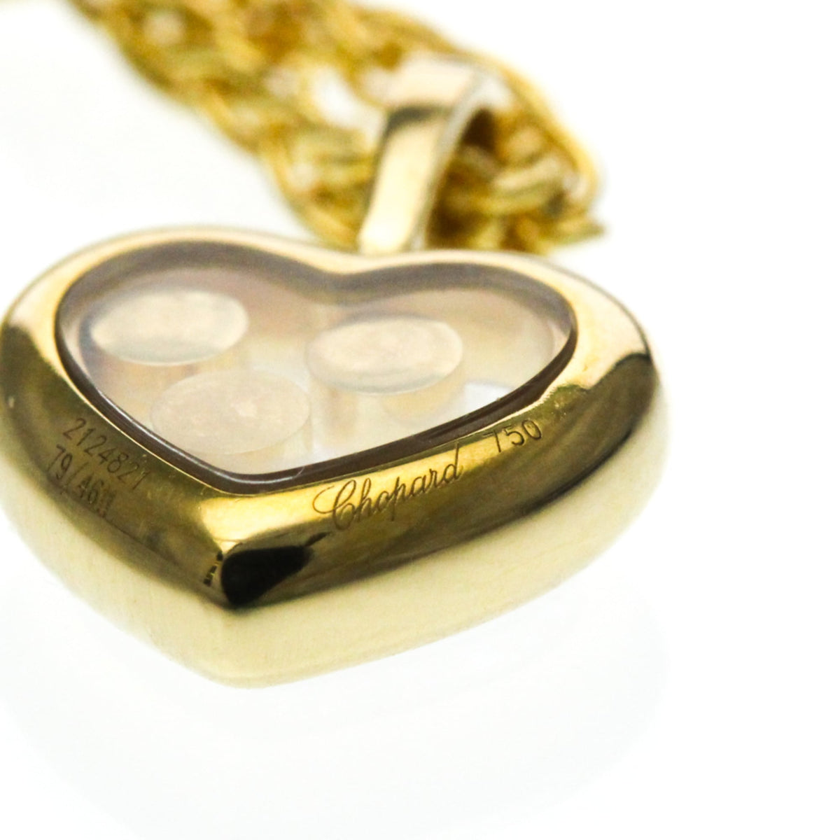 PRE-OWNED Chopard Happy Diamonds · 18K Yellow Gold