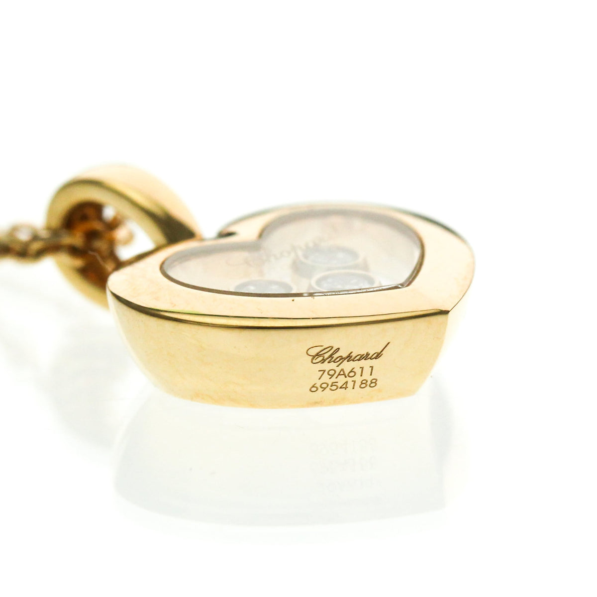 PRE-OWNED Chopard Happy Diamonds · Rose Gold · Diamond