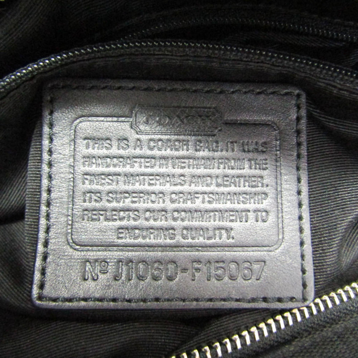PRE-OWNED Coach Signature · Canvas & Leather