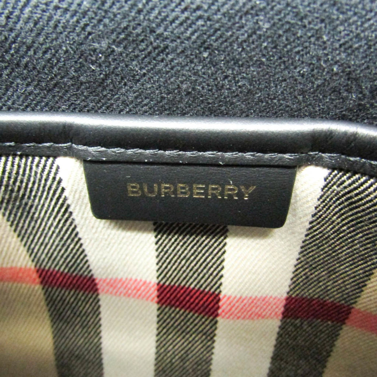 PRE-OWNED Burberry Enfild · Check Canvas & Leather