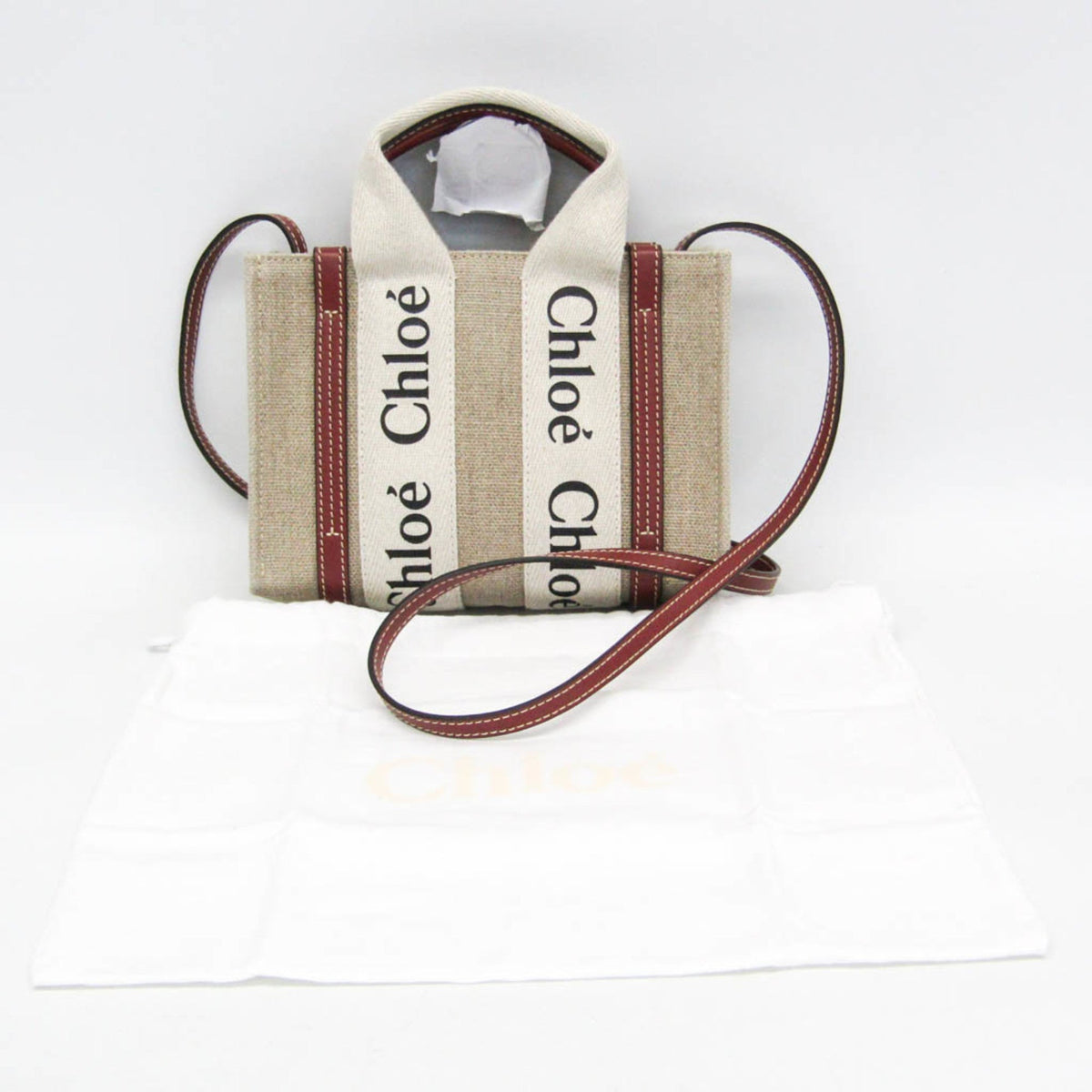 PRE-OWNED Chloé Woody Mini · Linen & Leather