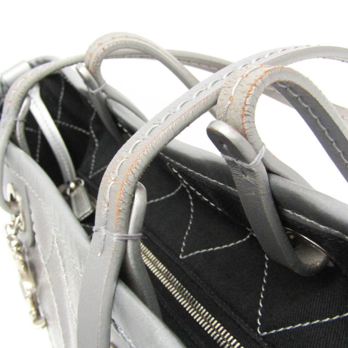 PRE-OWNED Chanel On the Road · Grained Calfskin
