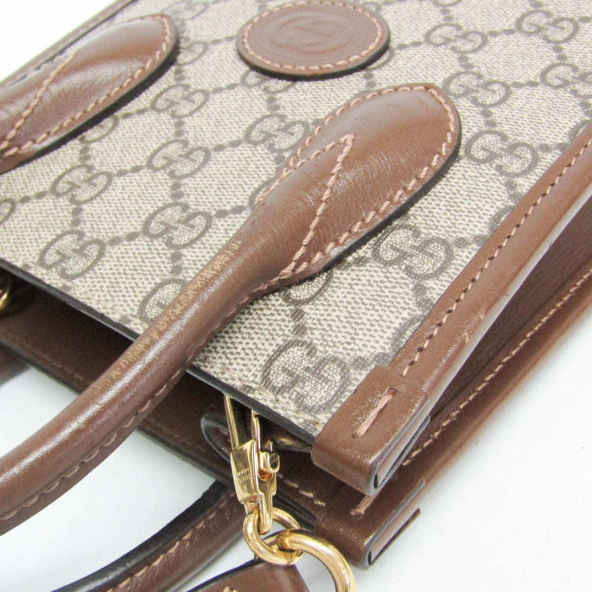 PRE-OWNED Gucci Interlocking G · GG Supreme · Leather