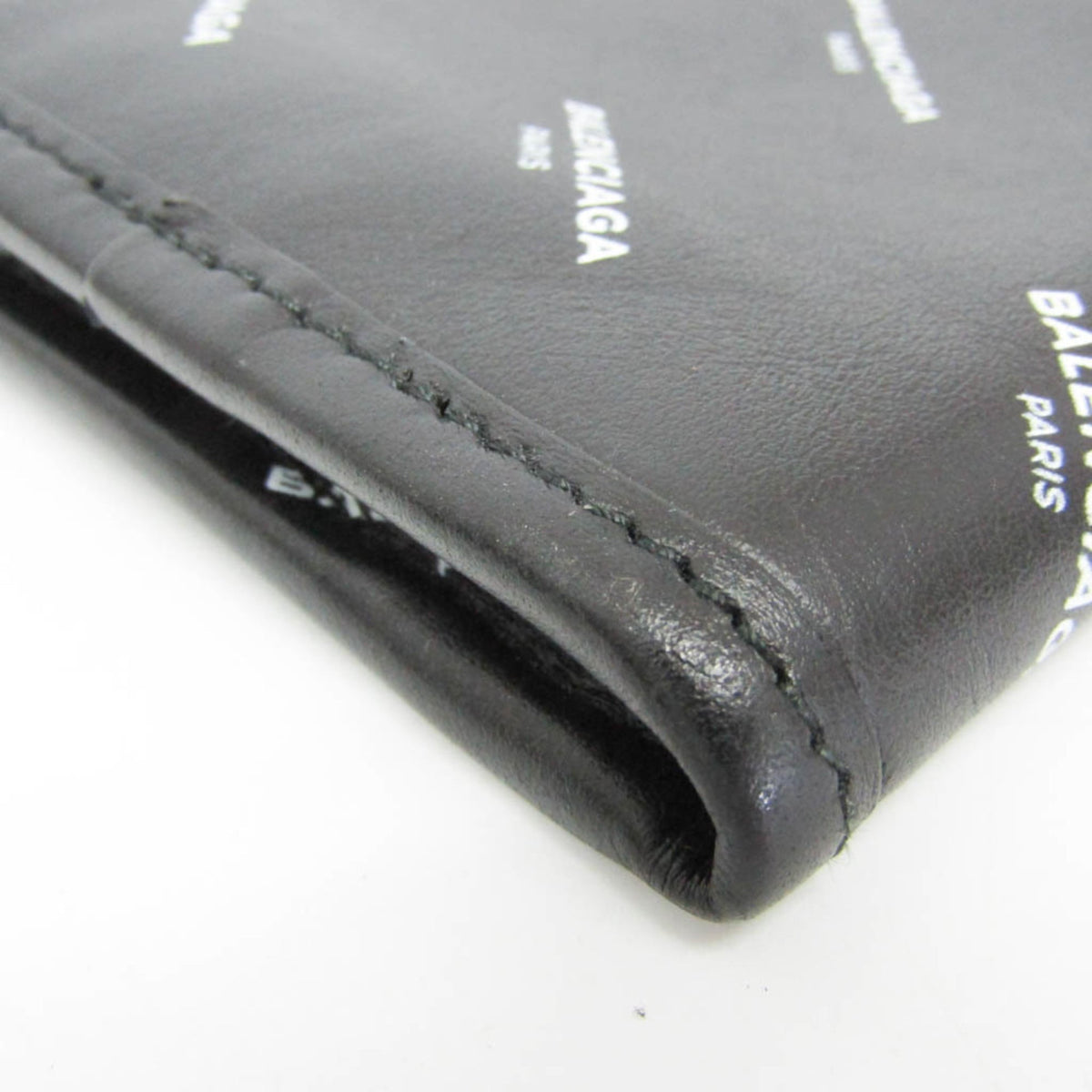 PRE-OWNED Balenciaga Logo Print Leather Clutch