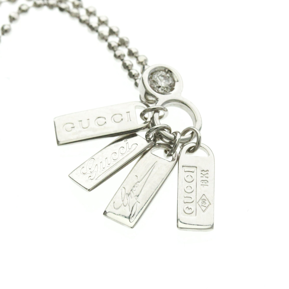 PRE-OWNED Gucci Diamond Tag · 18K White Gold