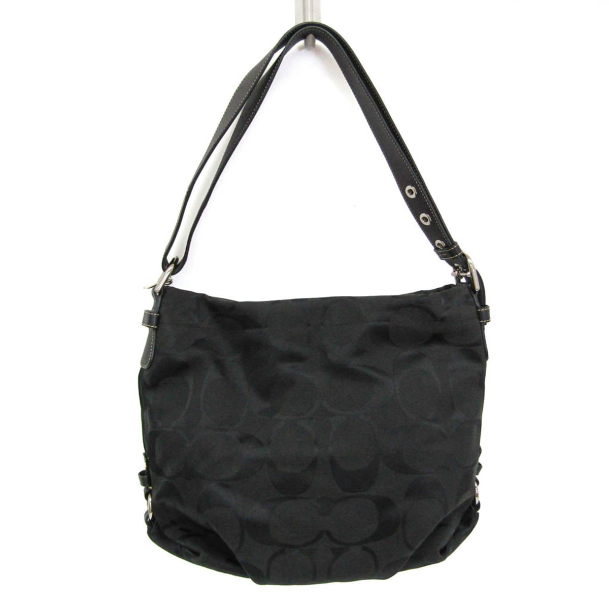 PRE-OWNED Coach Signature · Canvas & Leather
