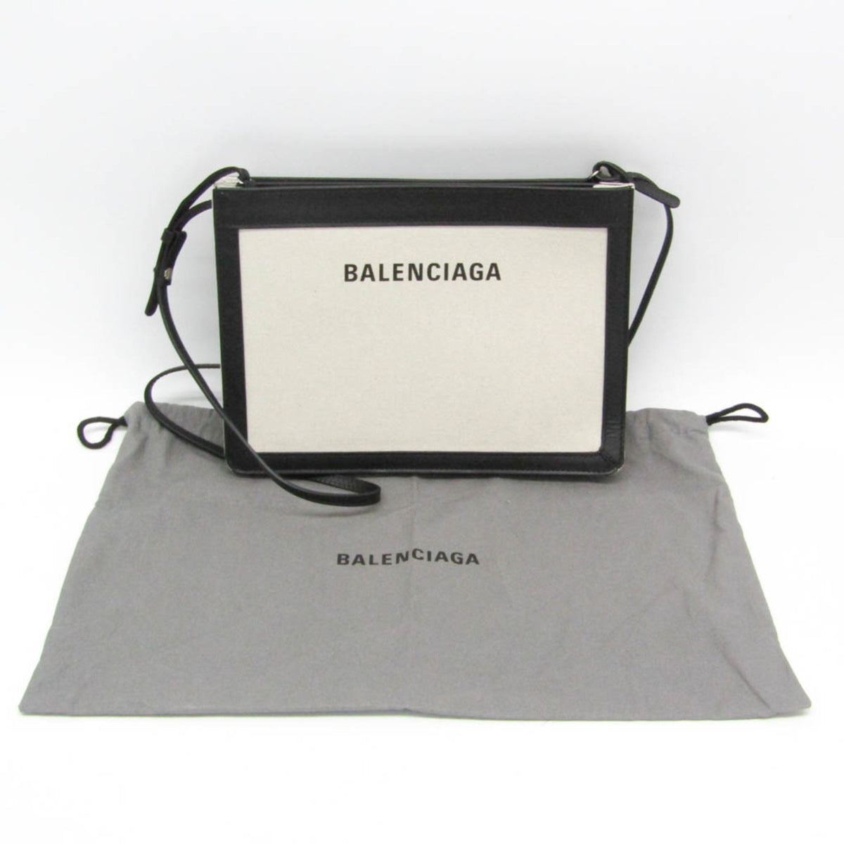 PRE-OWNED Balenciaga Navy Pochette · Canvas & Leather