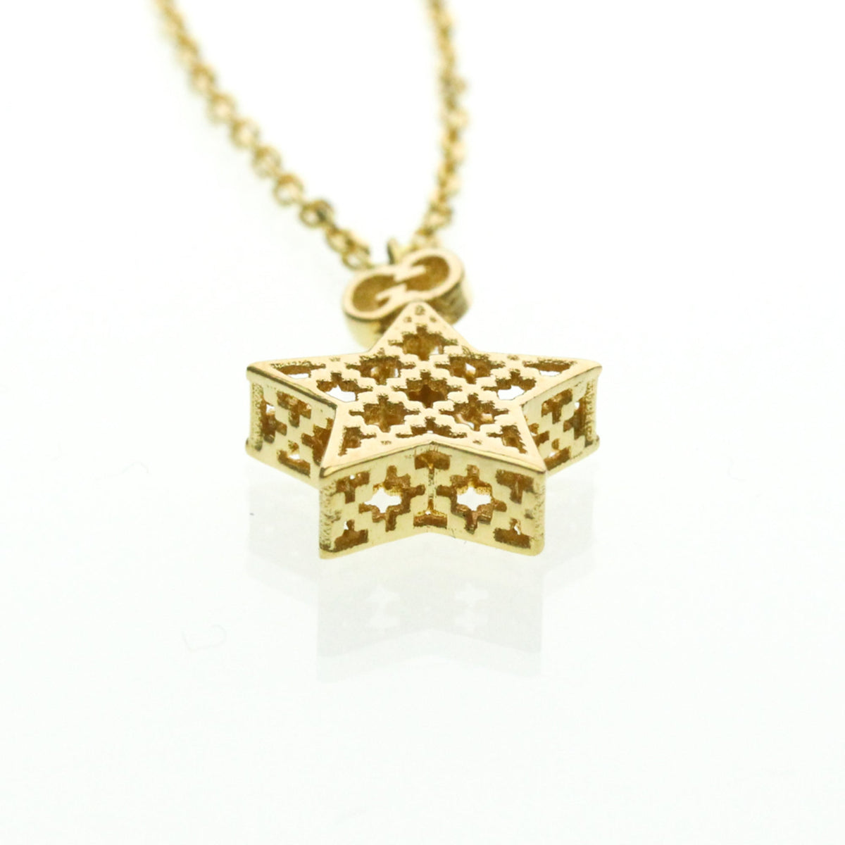 PRE-OWNED Gucci Diamantissima Star · 18K Yellow Gold