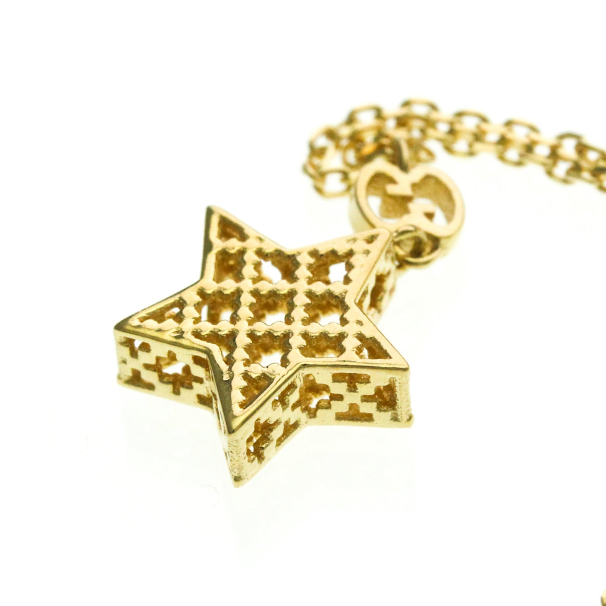 PRE-OWNED Gucci Diamantissima Star · 18K Yellow Gold