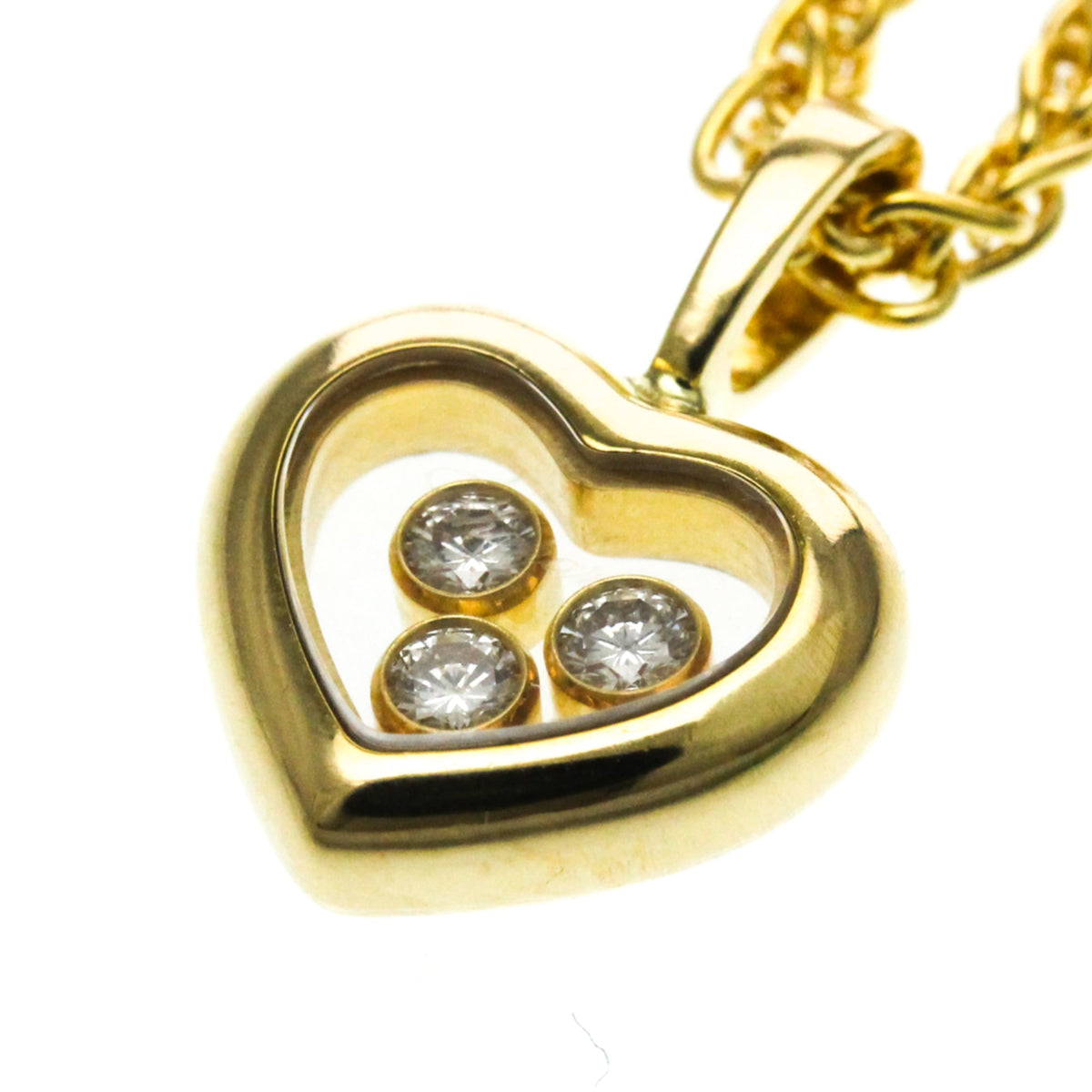 PRE-OWNED Chopard Happy Diamonds · 18K Yellow Gold