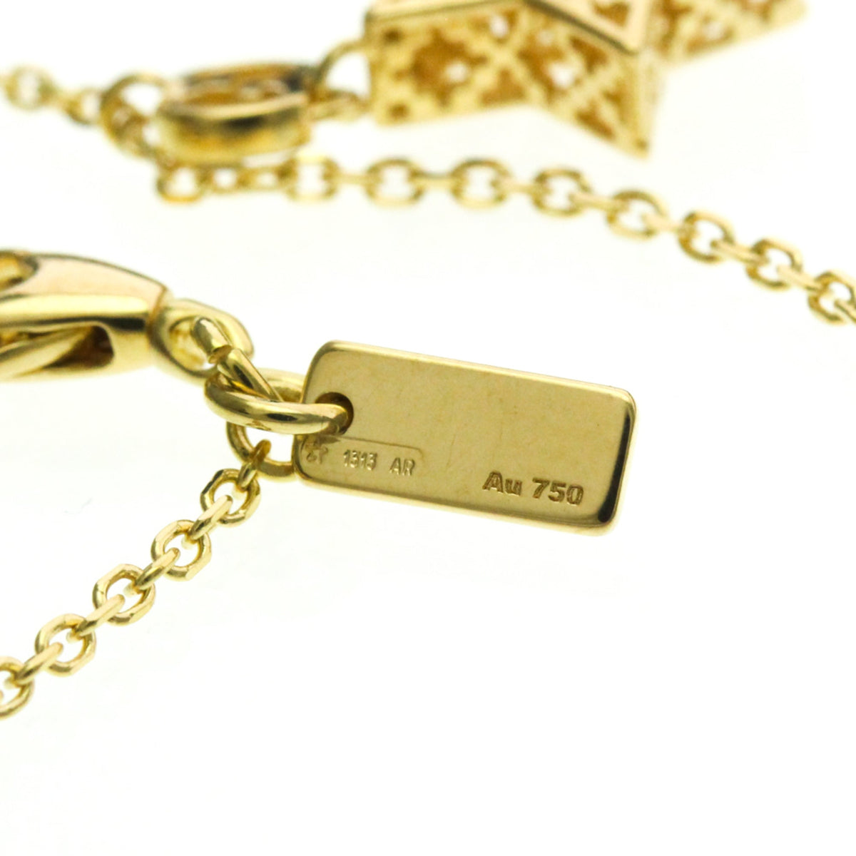 PRE-OWNED Gucci Diamantissima Star · 18K Yellow Gold