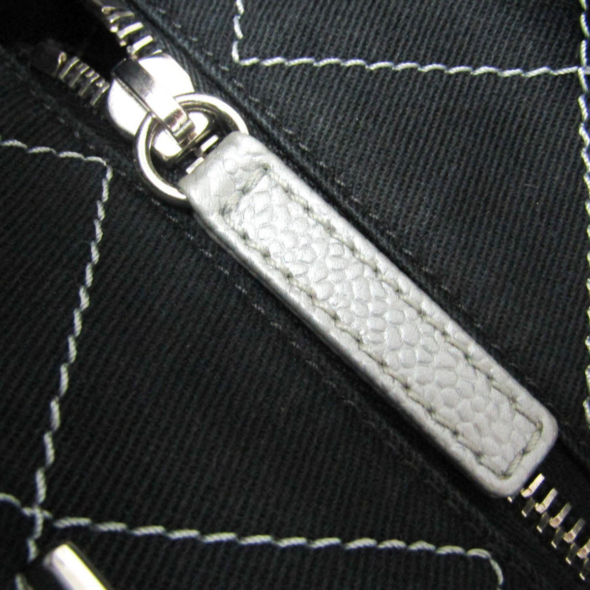 PRE-OWNED Chanel On the Road · Grained Calfskin