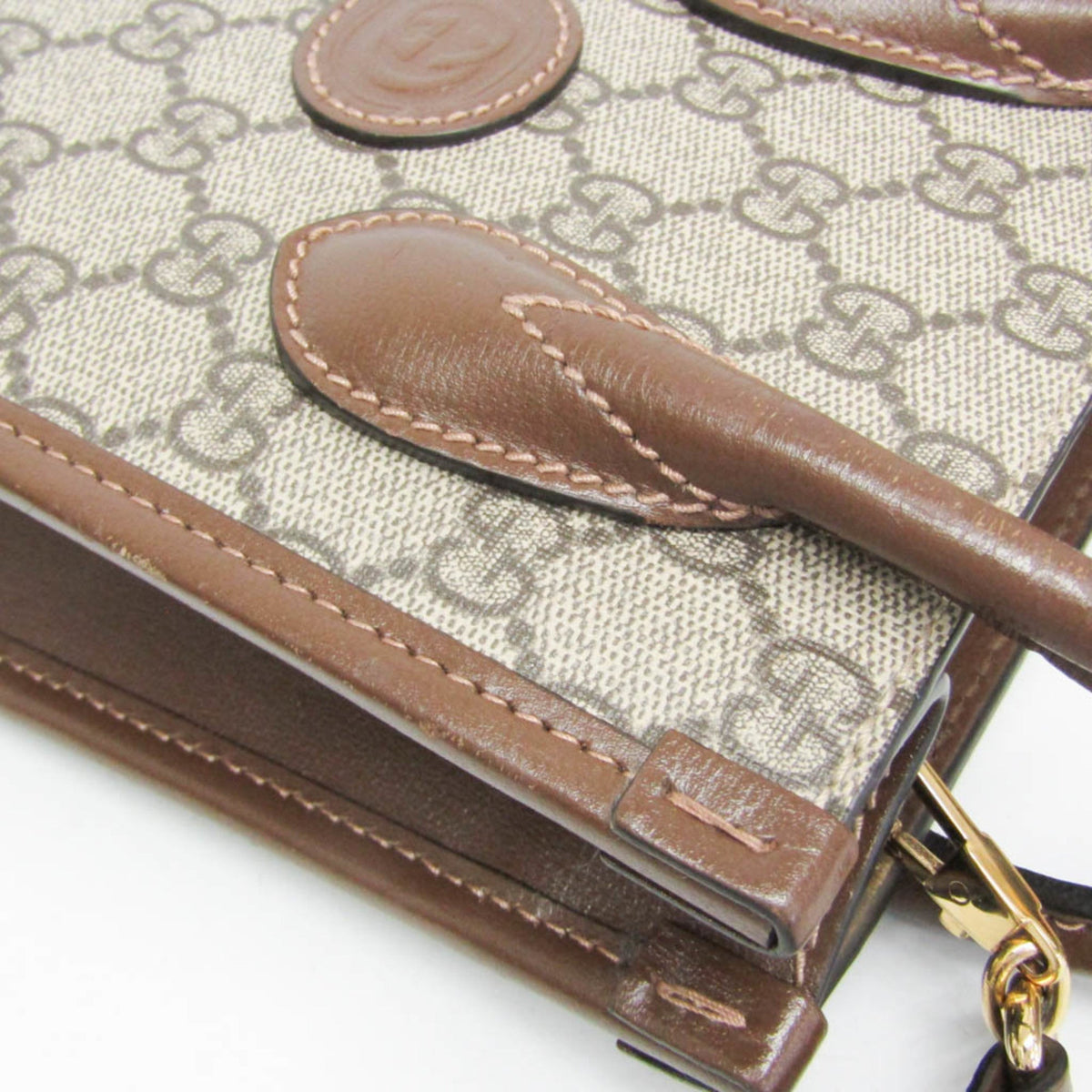 PRE-OWNED Gucci Interlocking G · GG Supreme · Leather