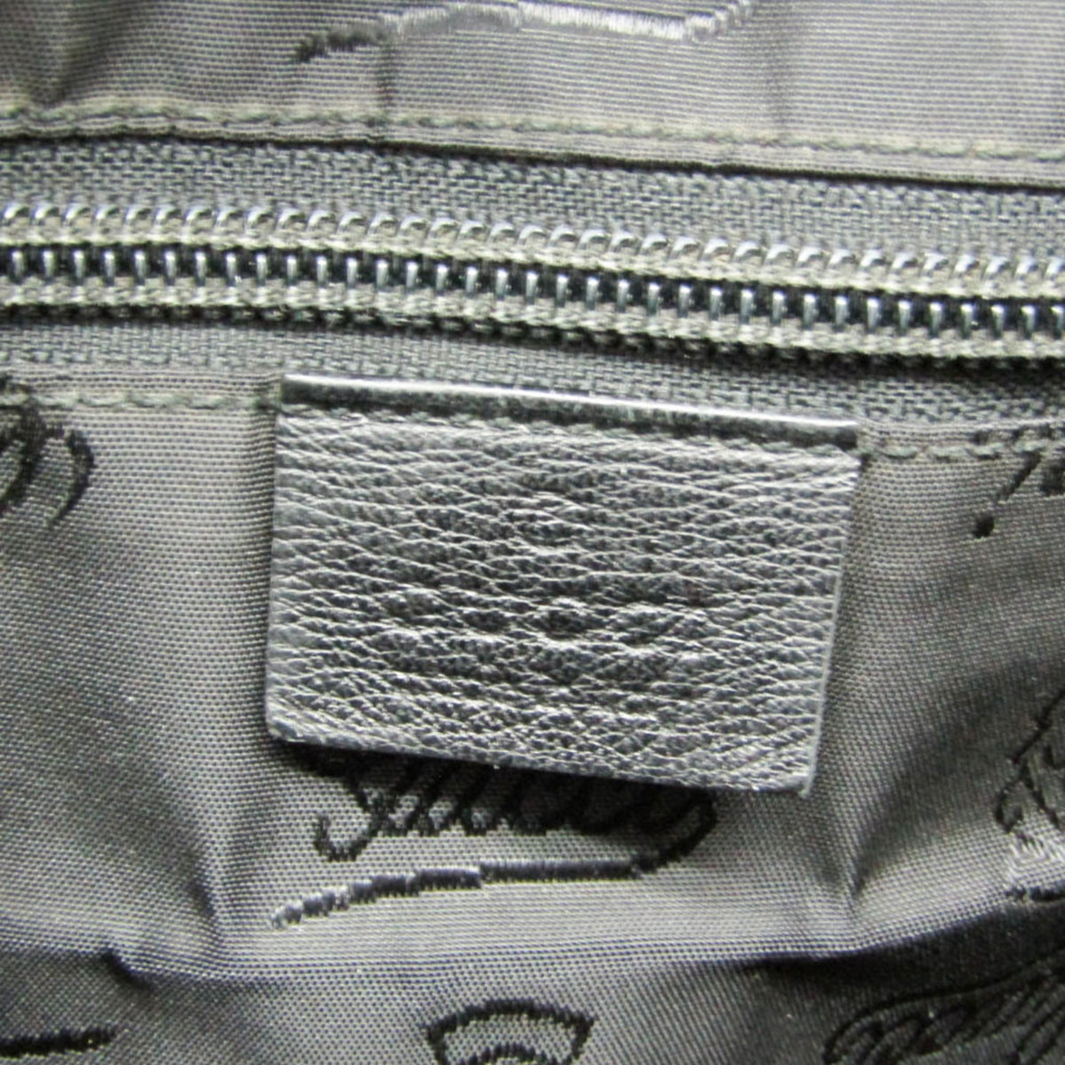 PRE-OWNED Gucci Guccissima · Embossed Leather