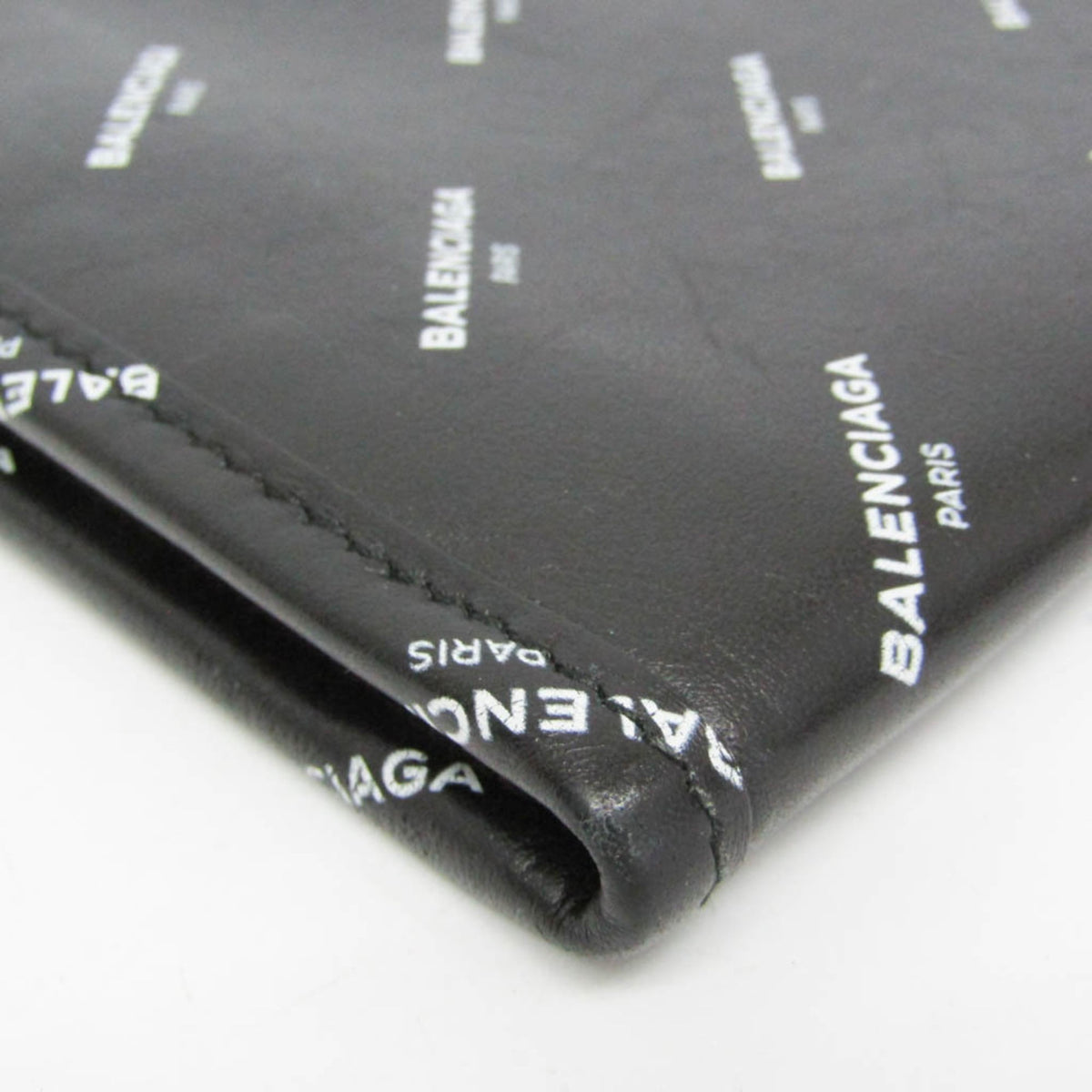 PRE-OWNED Balenciaga Logo Print Leather Clutch
