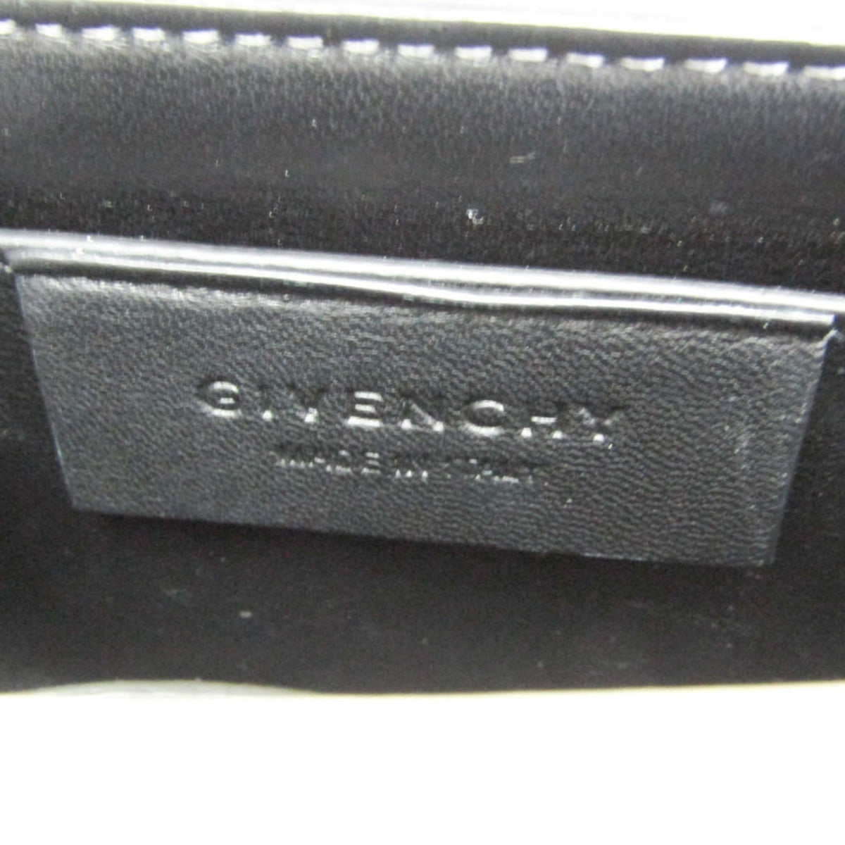 PRE-OWNED Givenchy Bow Cut · Ivory Leather