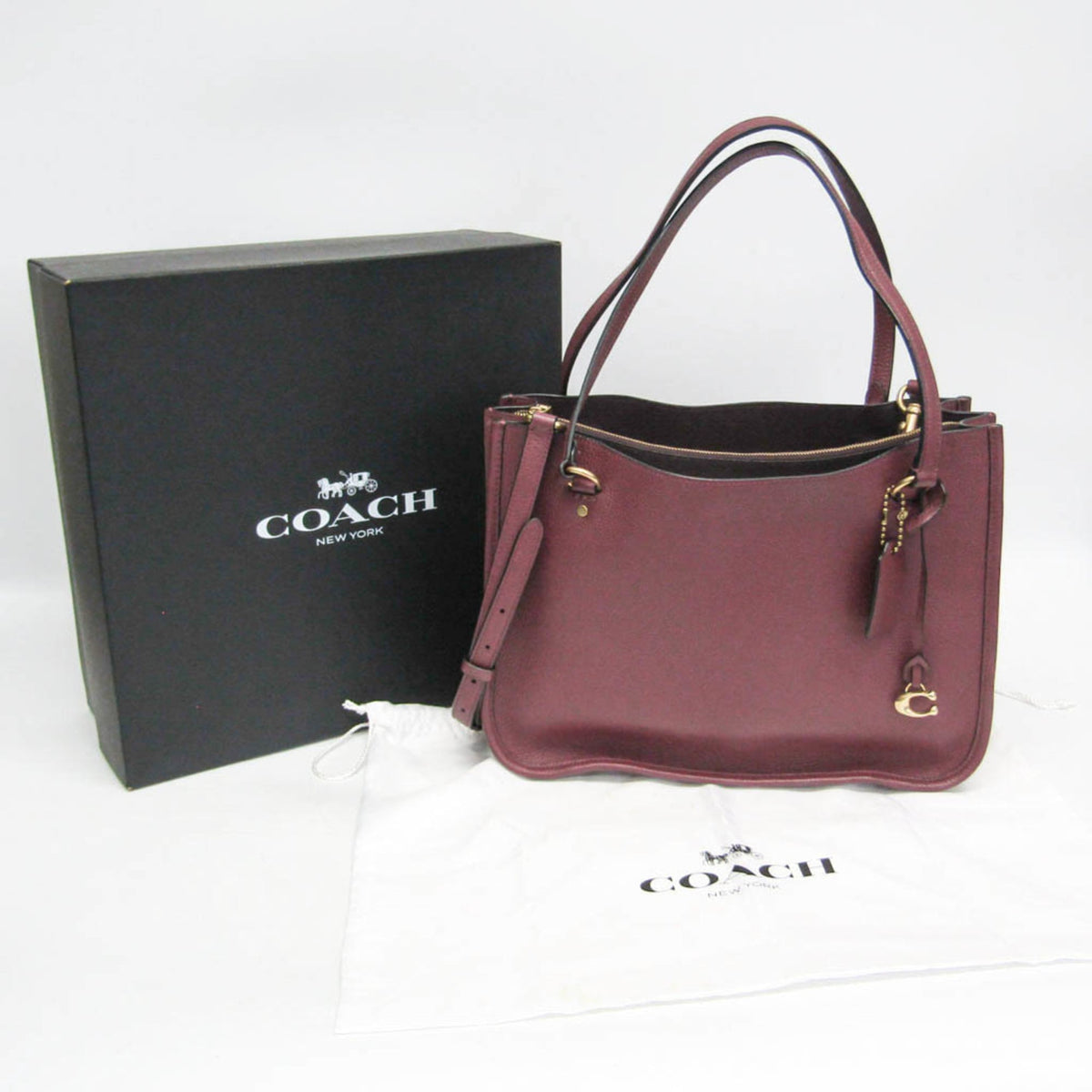 PRE-OWNED Coach Tyler Carryall · Leather