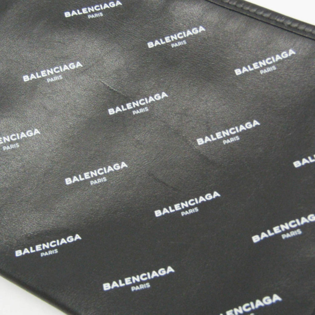 PRE-OWNED Balenciaga Logo Print Leather Clutch