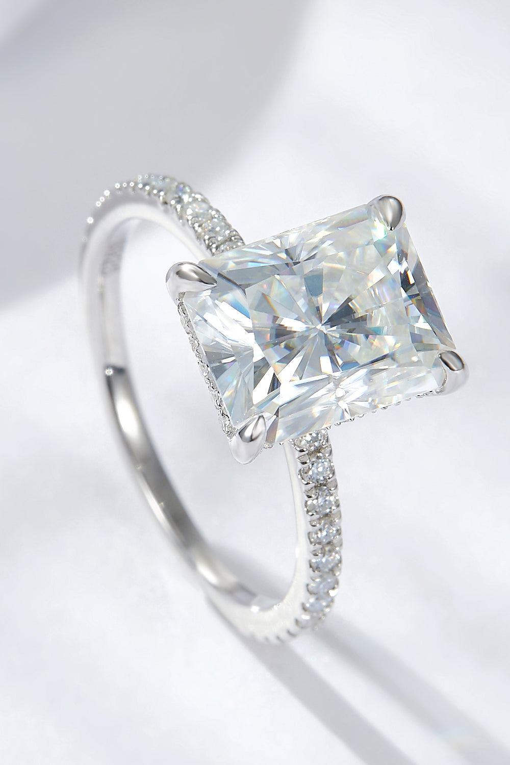 4 Carat Radiant-Cut Sparkala™ 4-Prong Side Stone Ring (Platinum Over Pure Sterling Silver)