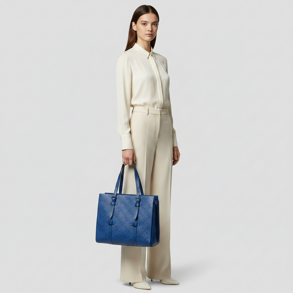 PRE-OWNED Gucci GG Embossed Tote · Leather