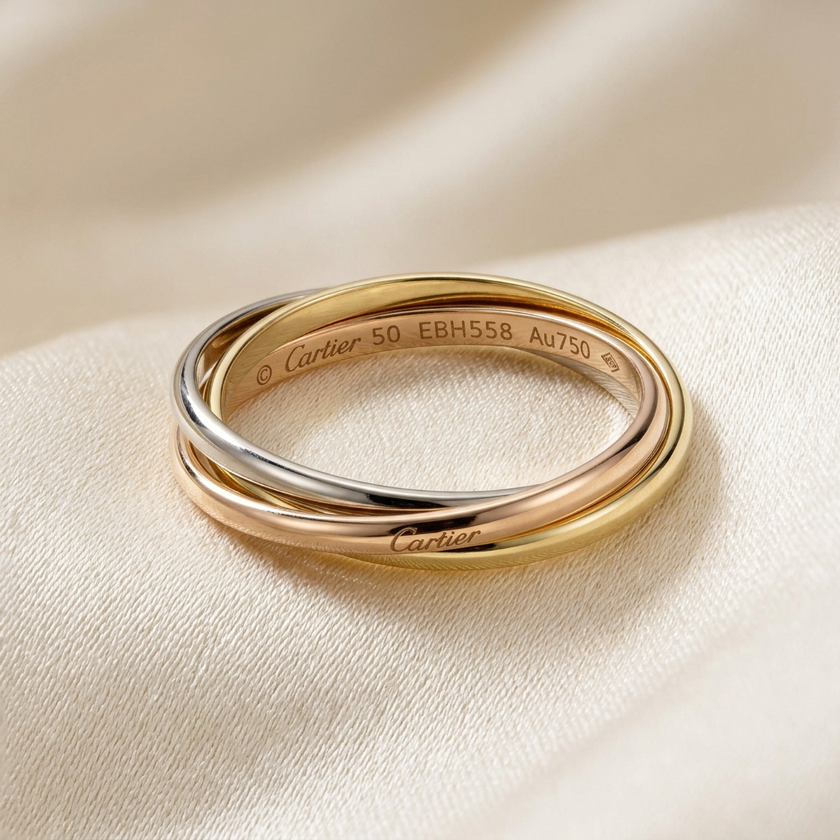 PRE-OWNED Cartier Trinity · Tri-Gold Size 5.25