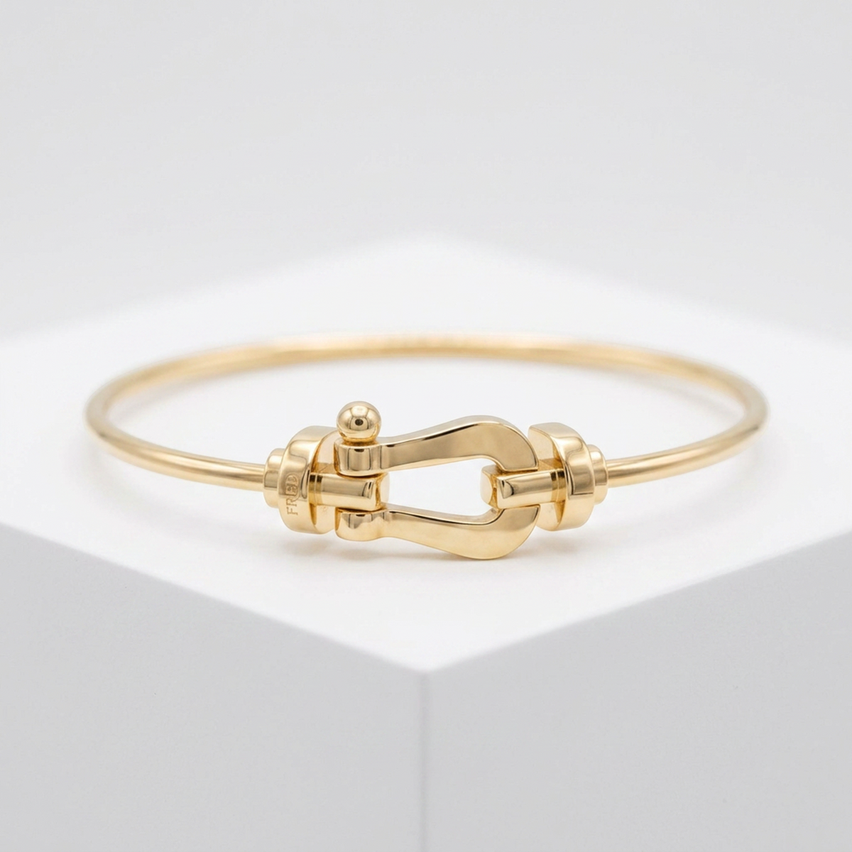 PRE-OWNED Fred Force 10 · 18K Yellow Gold