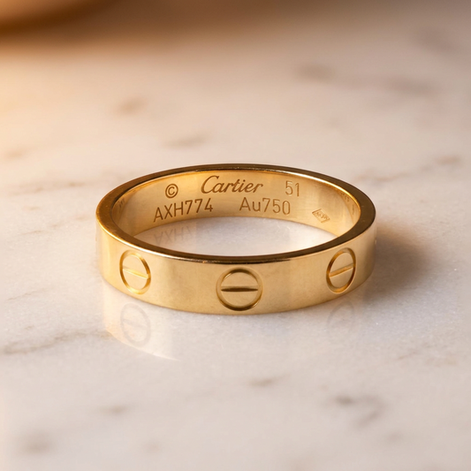PRE-OWNED Cartier Mini Love · 18K Yellow Gold