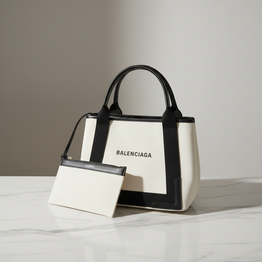 PRE-OWNED Balenciaga Navy Cabas S · Canvas & Leather