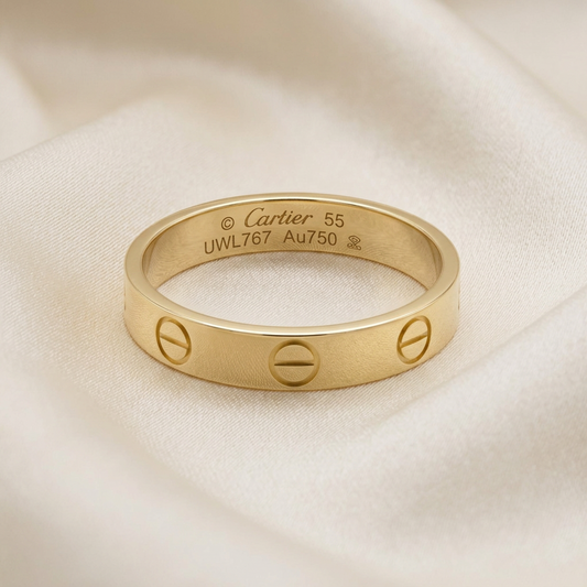 PRE-OWNED Cartier Mini Love · 18K Yellow Gold