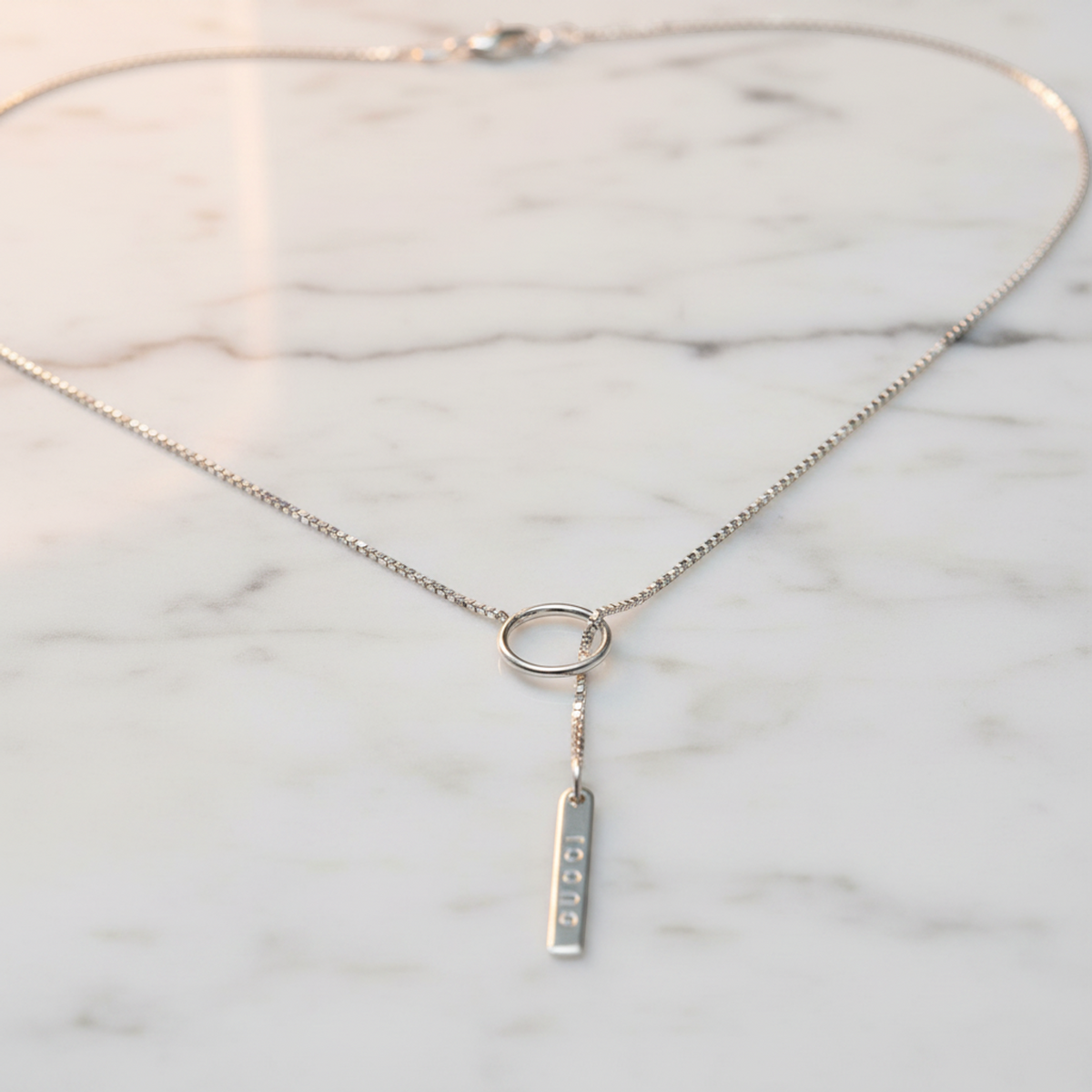 PRE-OWNED Gucci Lariat · 18K White Gold