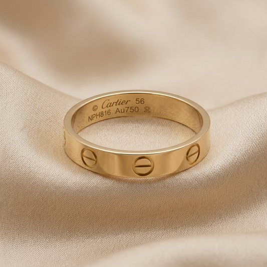 PRE-OWNED Cartier Mini Love · 18K Yellow Gold