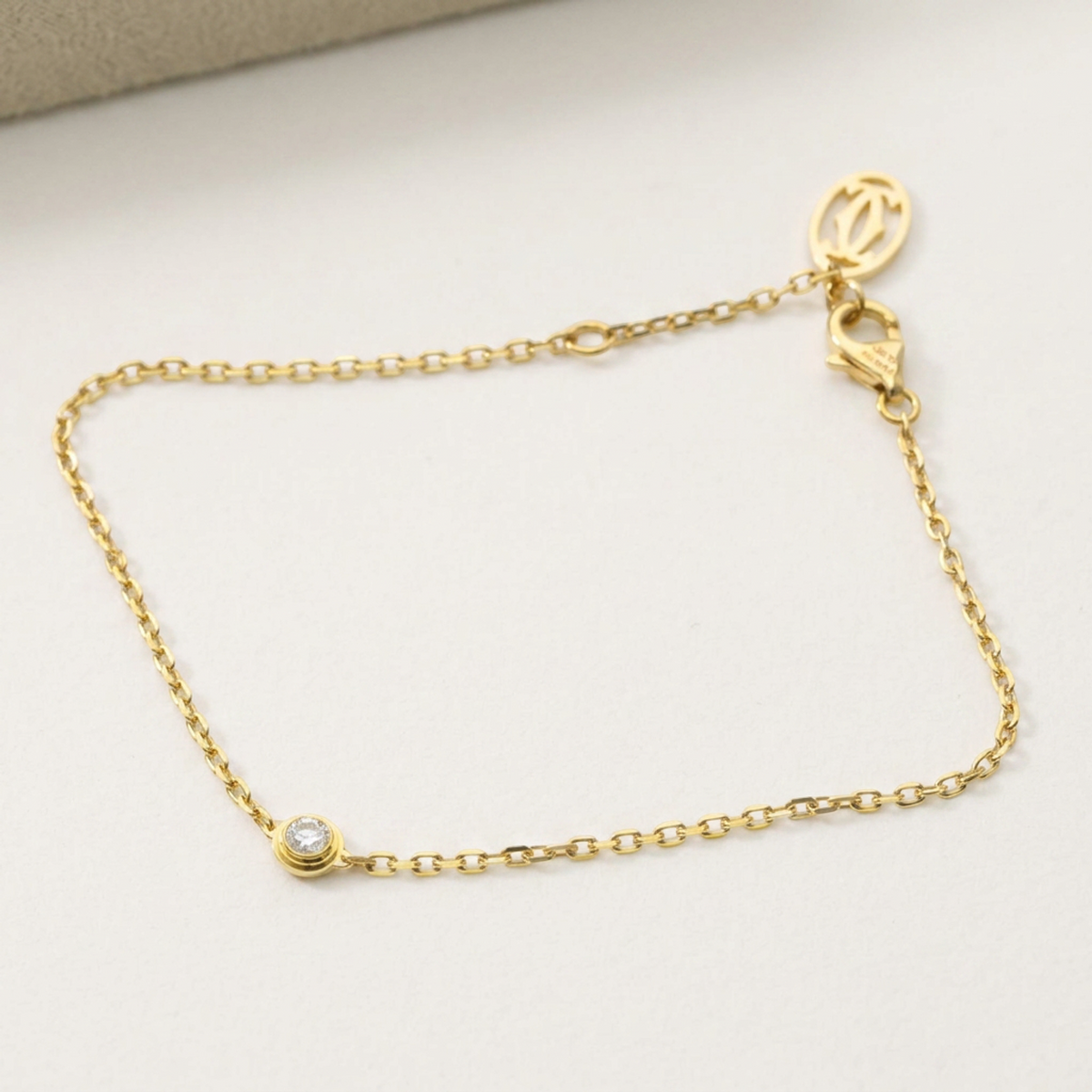 PRE-OWNED Cartier Damour · 18K Yellow Gold · Diamond