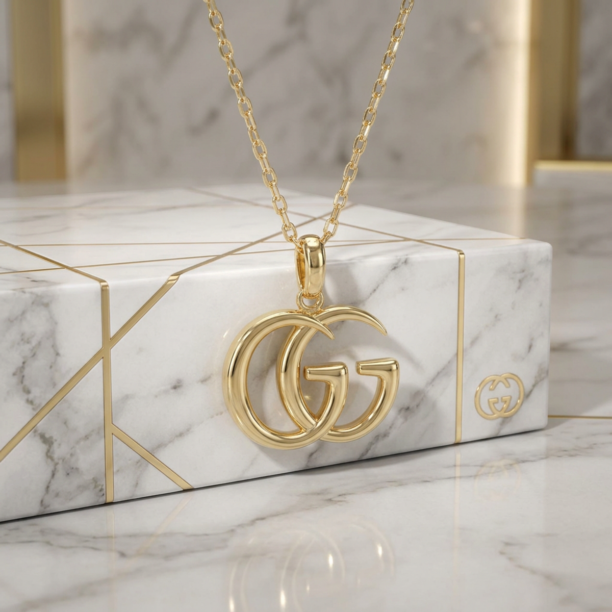 PRE-OWNED Gucci Double GG · 18K Yellow Gold