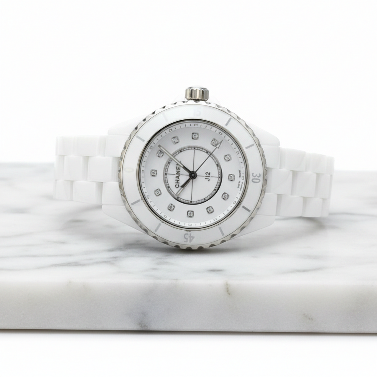 PRE-OWNED Chanel J12 · Diamond · Ceramic