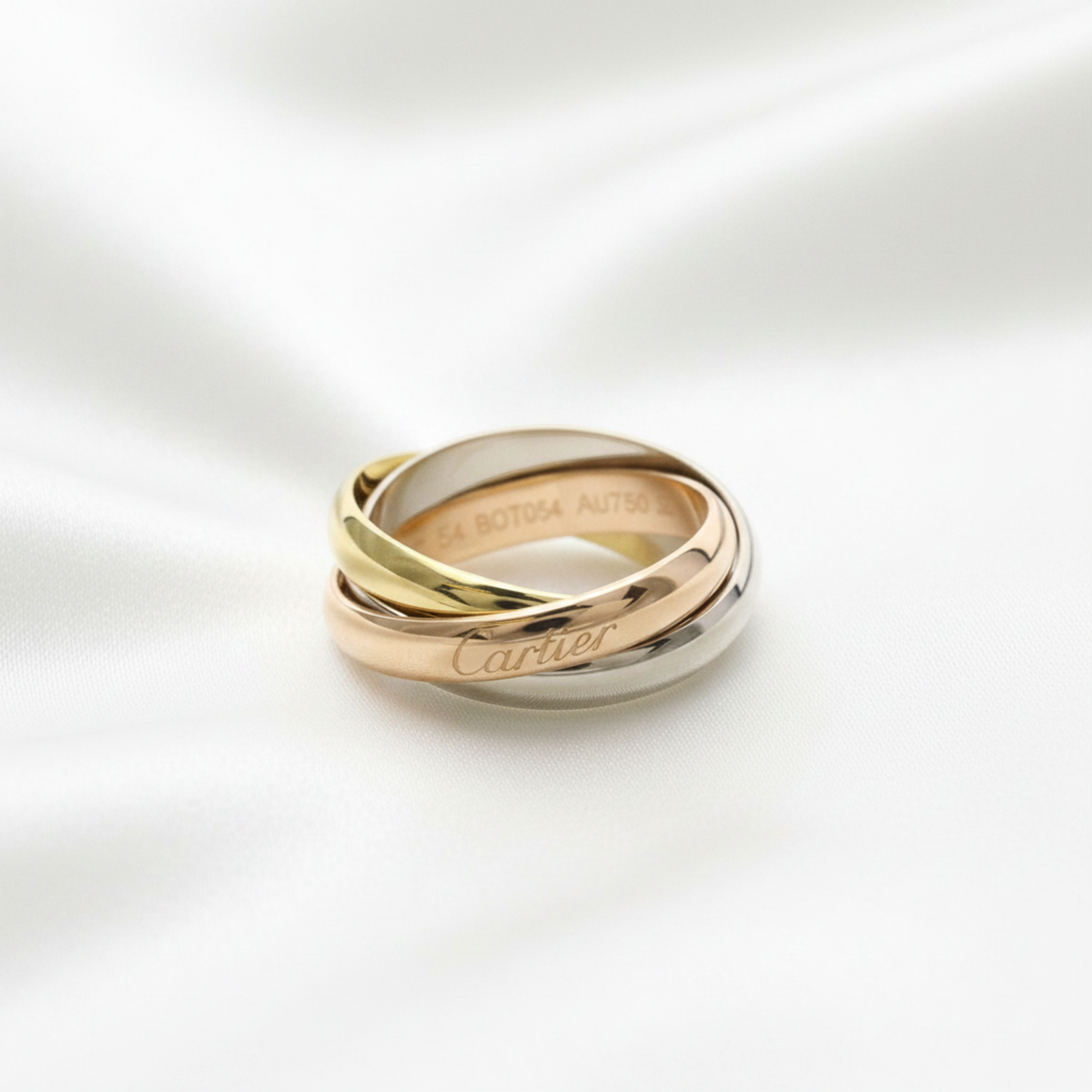 PRE-OWNED Cartier Trinity · Three Gold Size 6.75