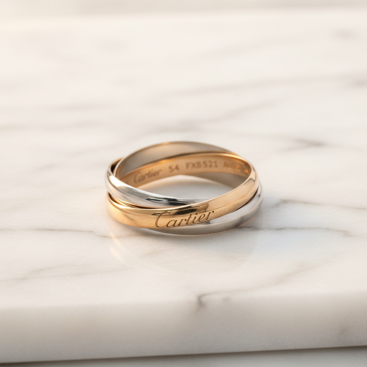 PRE-OWNED Cartier Trinity · Tri-Gold Size 6.75