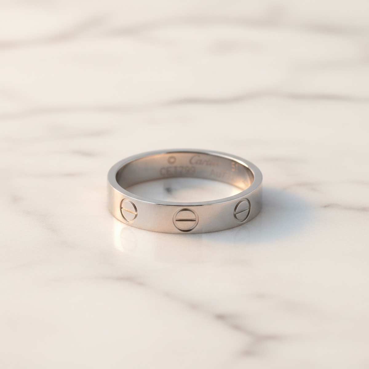 PRE-OWNED Cartier Mini Love · 18K White Gold