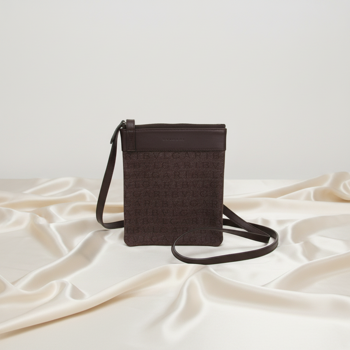PRE-OWNED Bvlgari Logomania · Crossbody Pouch · Denim
