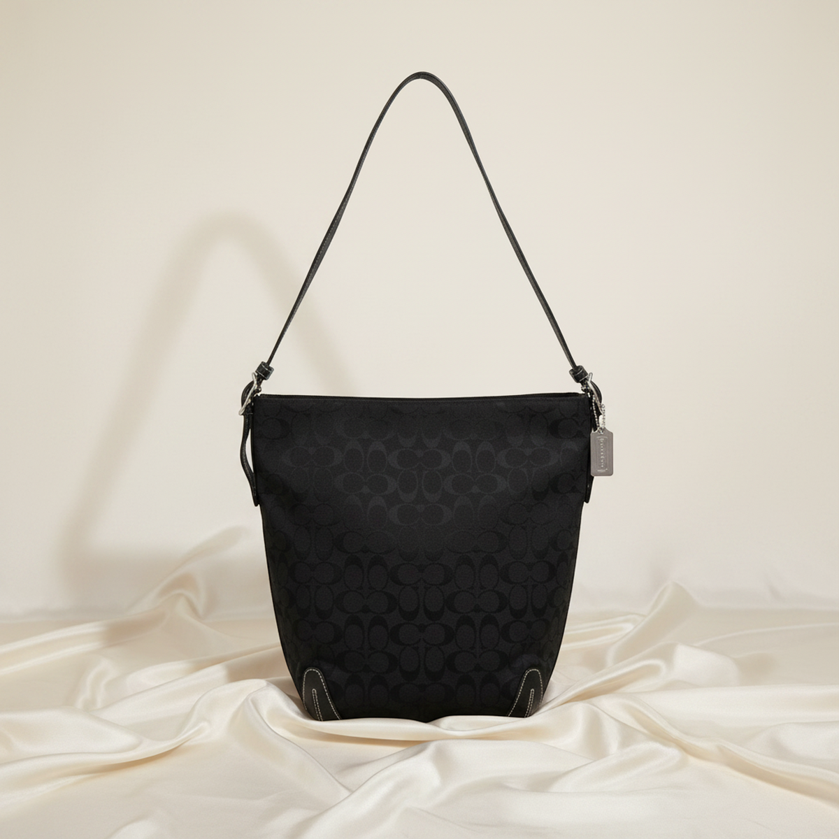 PRE-OWNED Coach Signature · Canvas & Leather