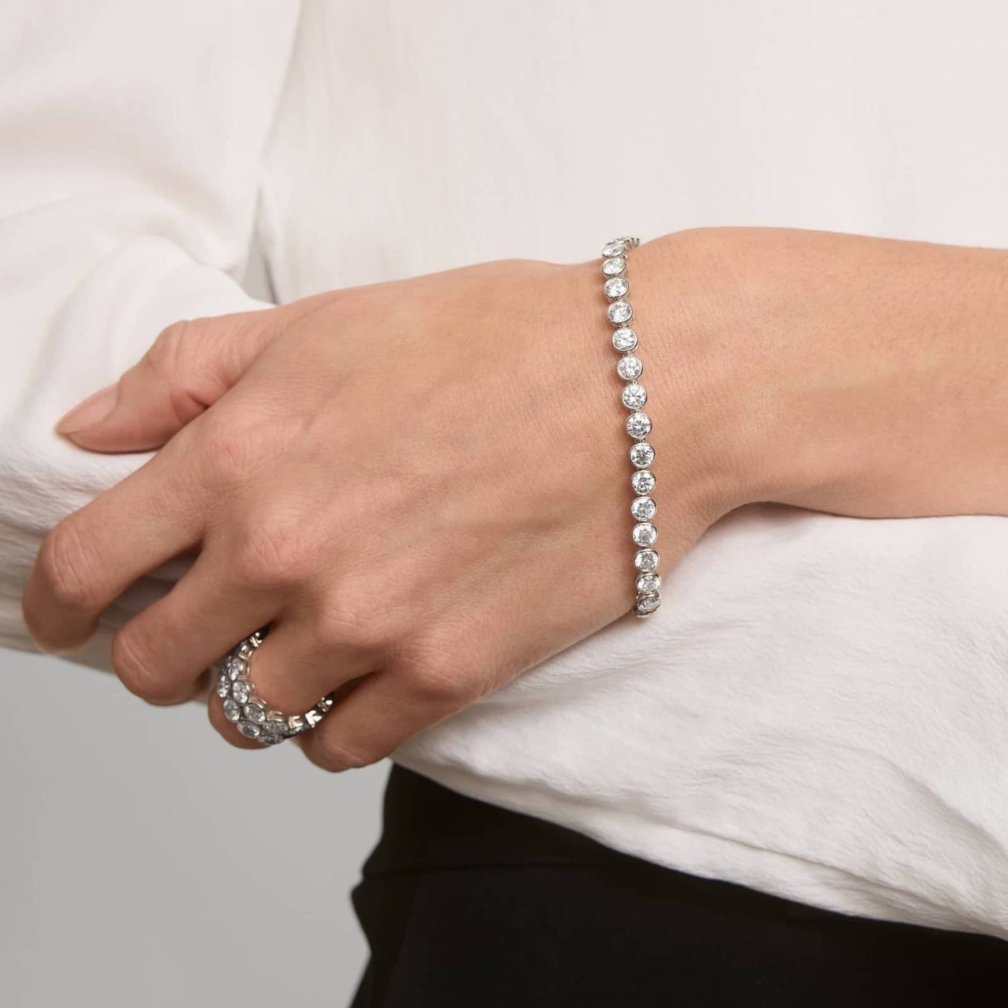 10 CTW Bezel Set Created Moissanite Tennis Bracelet in 14Kt Gold Plated – Round Cut, 7 Inch