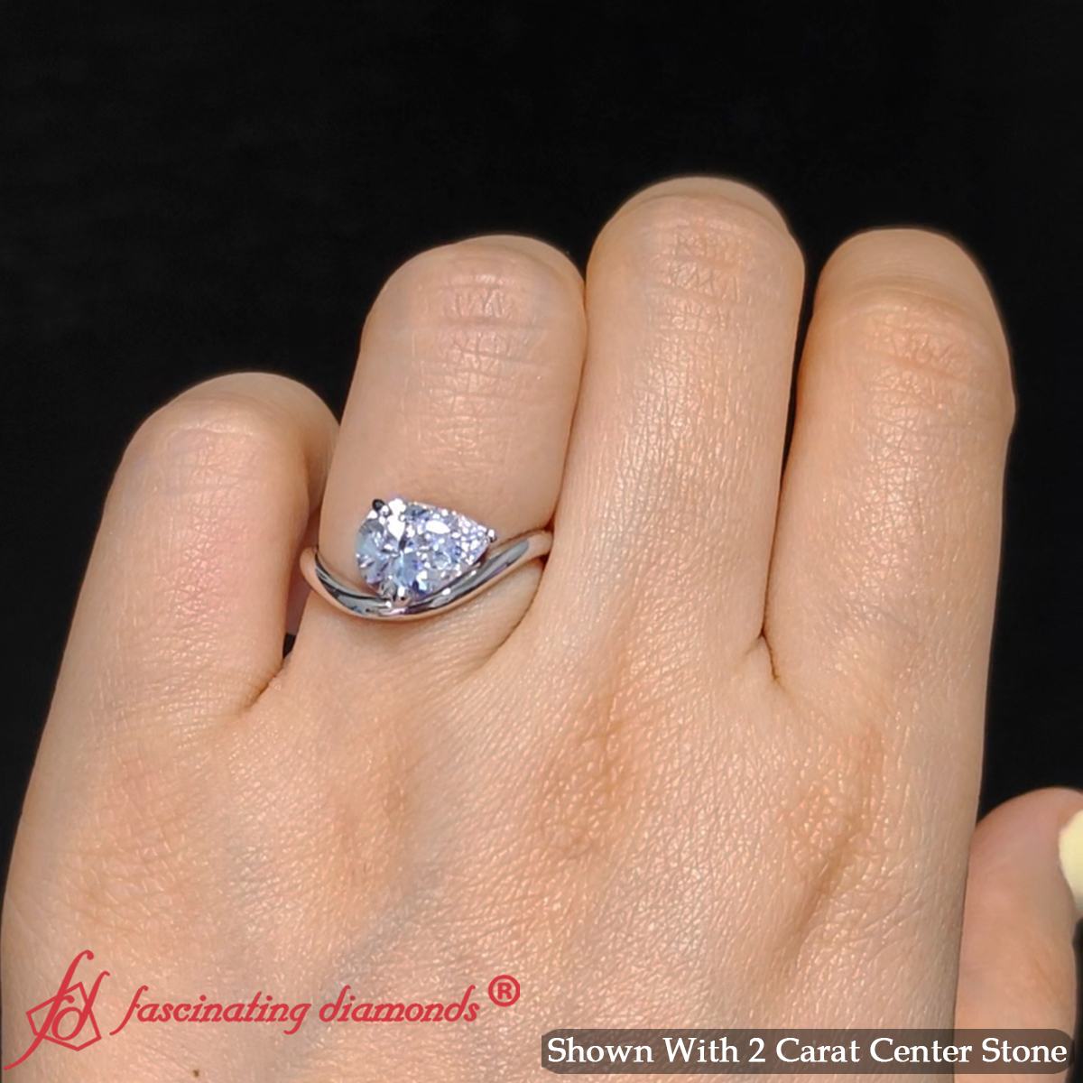 Pear Shaped Curve Shank Solitaire Diamond Ring