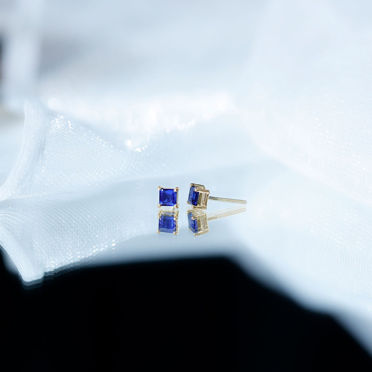 0.9 Carat Solitaire Blue Sapphire Princess Cut Stud Earrings