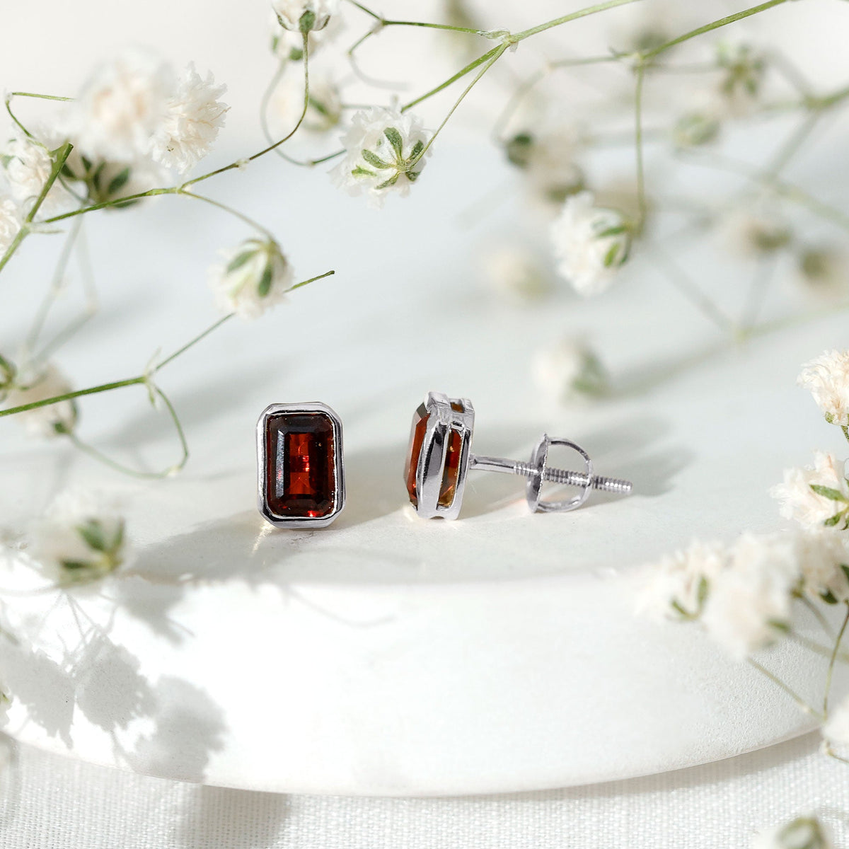 1.4 CT Emerald Cut Garnet Solitaire Stud Earrings in Bezel Setting