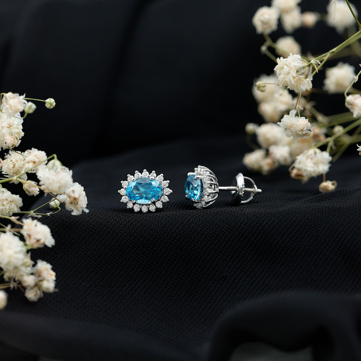 1.6 Carat Oval London Blue Topaz Stud Earrings with Diamond Halo